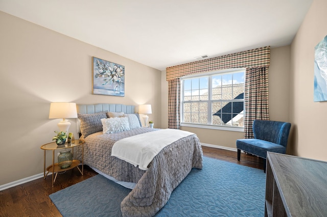 bedroom featuring dark hardwood / wood-style floors