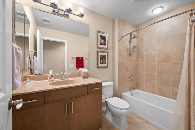 full bathroom with shower / bath combination with curtain, vanity, tile patterned floors, and toilet