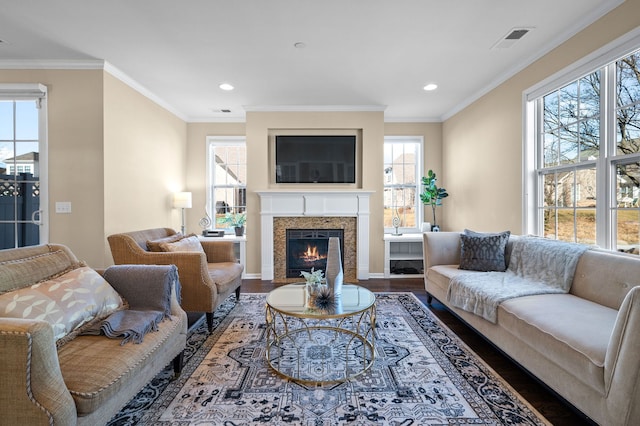 living room with dark wood-type flooring and ornamental molding