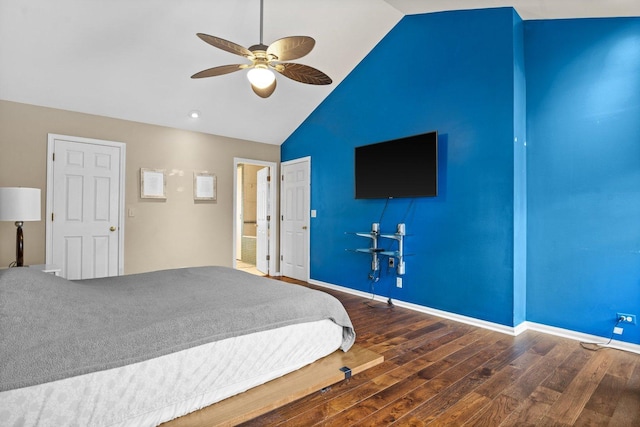 bedroom with ceiling fan, hardwood / wood-style floors, and high vaulted ceiling