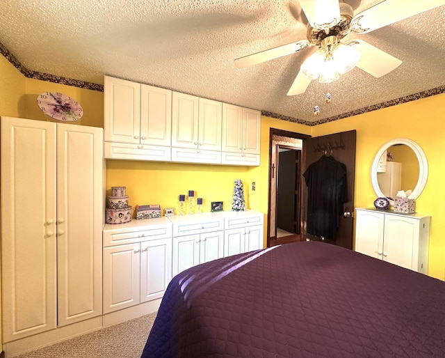 bedroom with light carpet, a textured ceiling, and ceiling fan