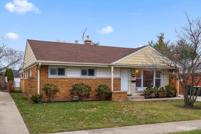 view of front of property with a front lawn