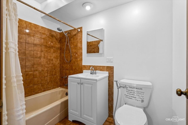 full bathroom featuring vanity, toilet, and shower / tub combo with curtain