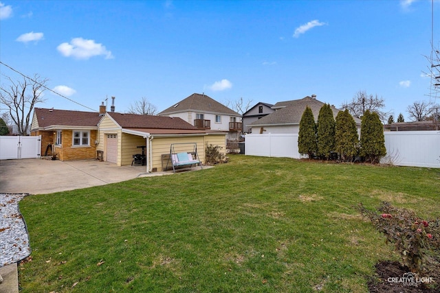 7825 N Oconto Ave, Niles, IL 60714 - rear view of property featuring concrete driveway, a fenced backyard, a patio, an attached garage, and a chimney