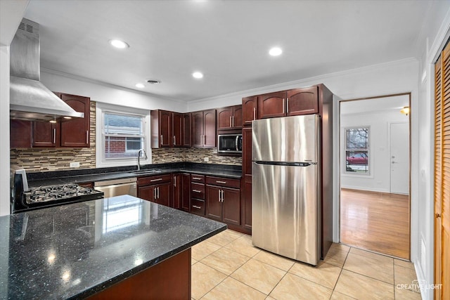 7825 N Oconto Ave, Niles, IL 60714 - kitchen with appliances with stainless steel finishes, ventilation hood, crown molding, tasteful backsplash, and dark stone counters