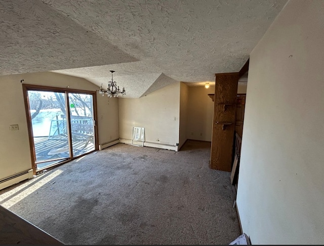 unfurnished living room with carpet flooring, a textured ceiling, a baseboard heating unit, an inviting chandelier, and lofted ceiling