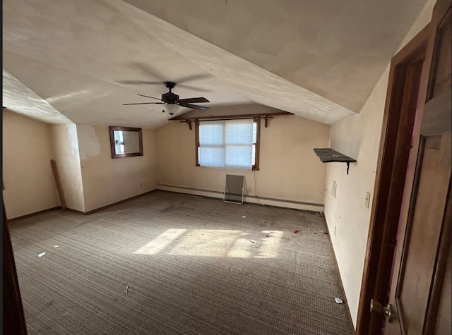 bonus room featuring light carpet, ceiling fan, a baseboard radiator, and lofted ceiling