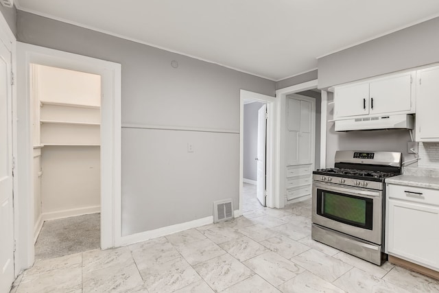 kitchen with white cabinetry and stainless steel range with gas cooktop