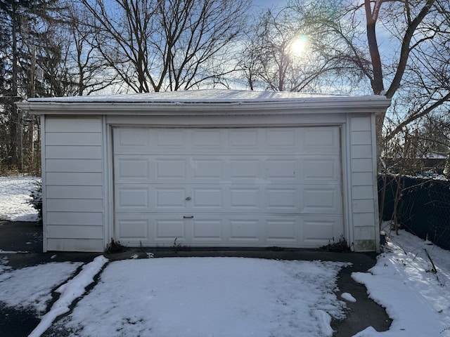 view of snow covered garage