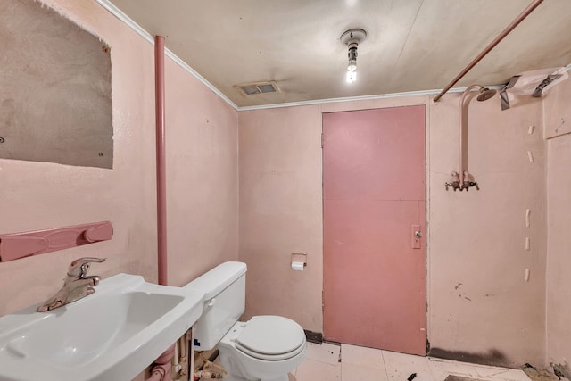 bathroom with sink and toilet