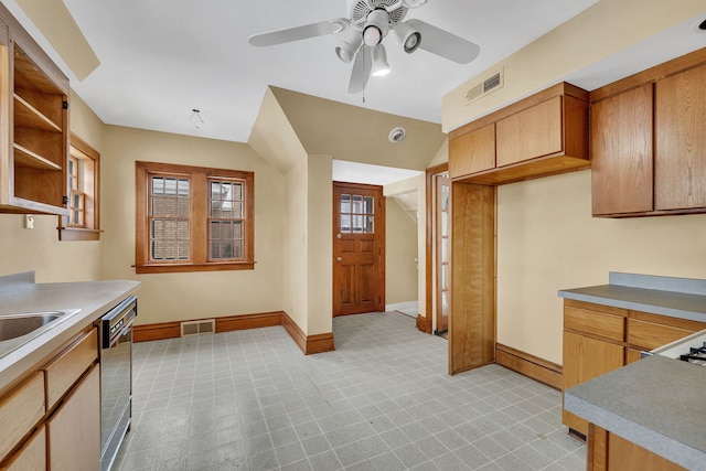 kitchen featuring ceiling fan and dishwasher