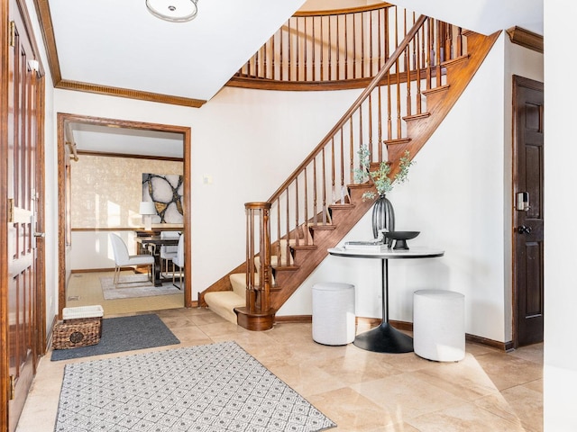 entrance foyer with crown molding