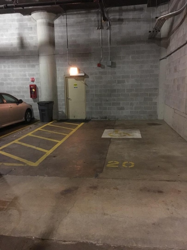 1525 S Sangamon St Unit 317P, Chicago, IL 60608 - parking deck featuring concrete block wall