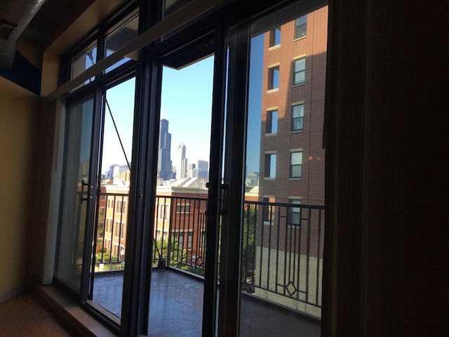 1525 S Sangamon St Unit 317P, Chicago, IL 60608 - entryway featuring a city view and wood finished floors