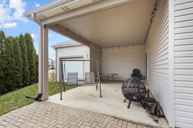 view of patio featuring a fire pit