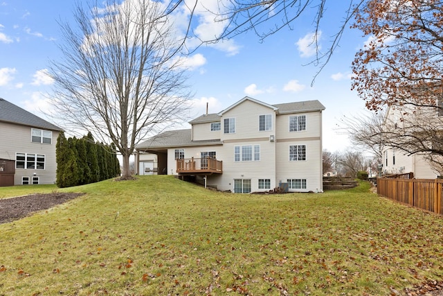 rear view of property featuring a yard