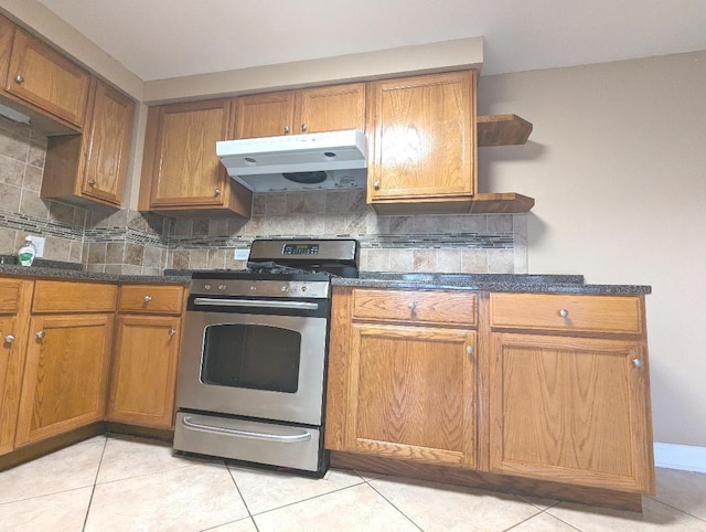 full bathroom with tile patterned floors, vanity, toilet, and shower / washtub combination