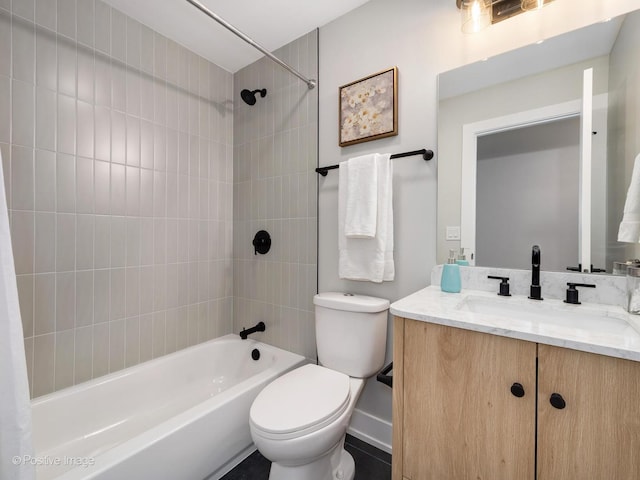 full bathroom with vanity, toilet, and shower / bath combo with shower curtain