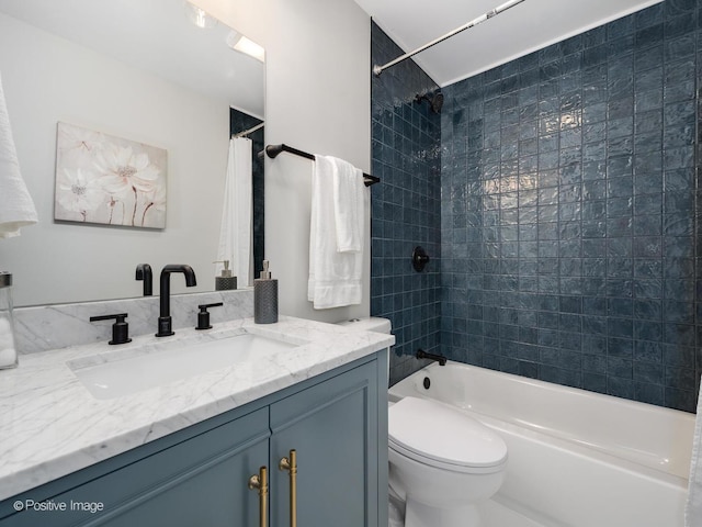 full bathroom with vanity, toilet, and shower / bath combo