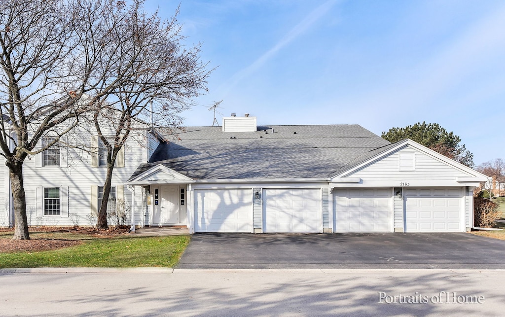 view of front of house with a garage