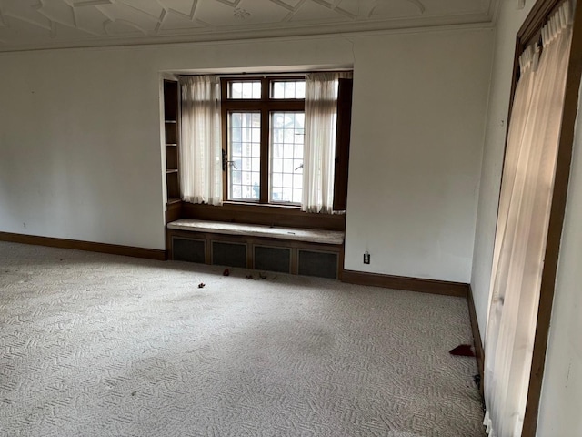 unfurnished room featuring carpet floors