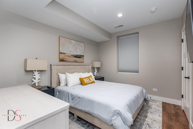 bedroom featuring hardwood / wood-style floors