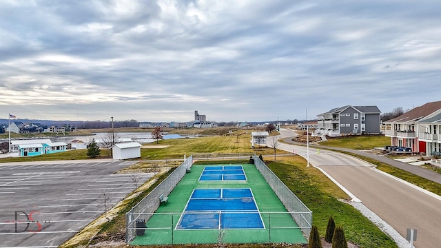 exterior space with tennis court