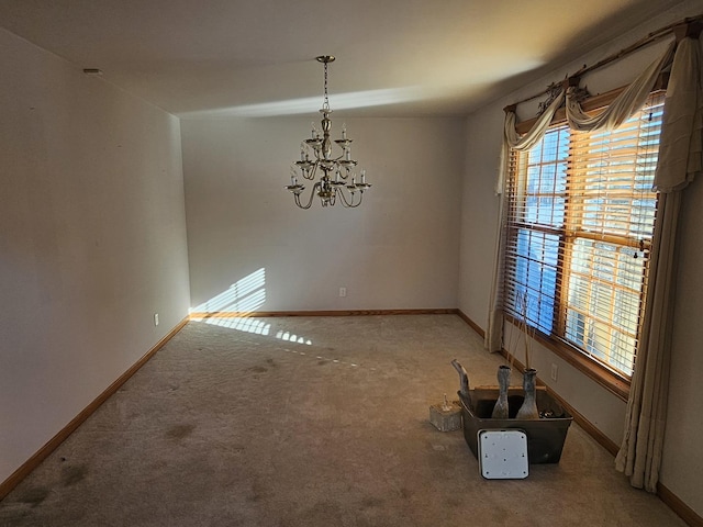 unfurnished dining area featuring carpet