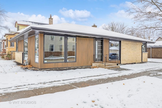 view of snow covered property