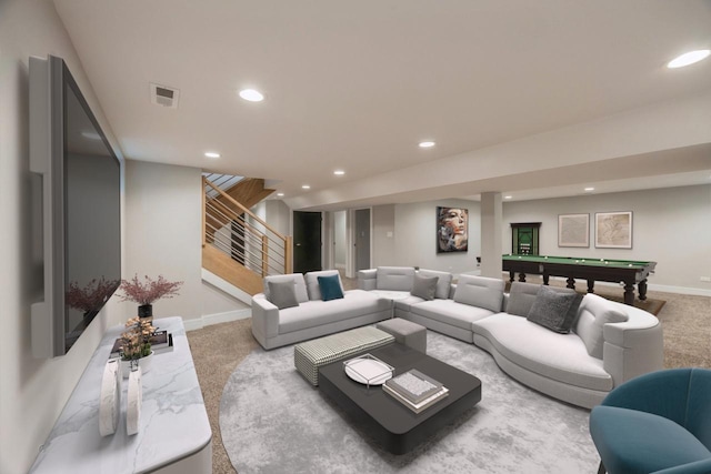 carpeted living room with pool table