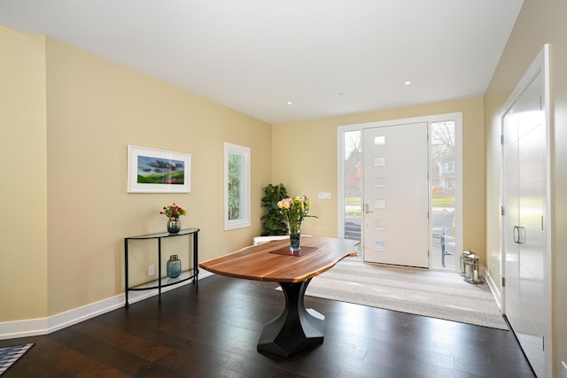 doorway to outside with dark hardwood / wood-style floors