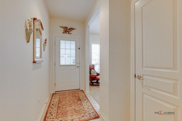 doorway featuring light tile patterned floors