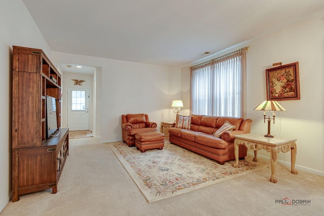 living room featuring light carpet