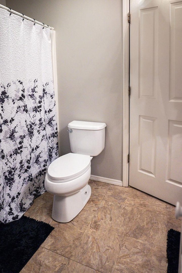 bathroom featuring toilet