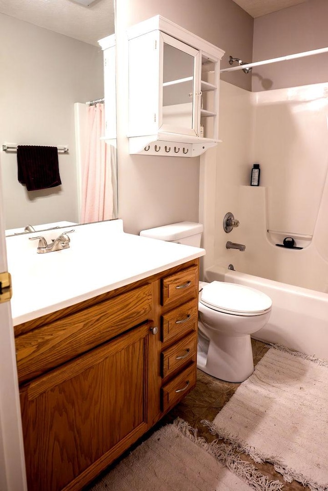 full bathroom featuring toilet, vanity, and shower / tub combo with curtain