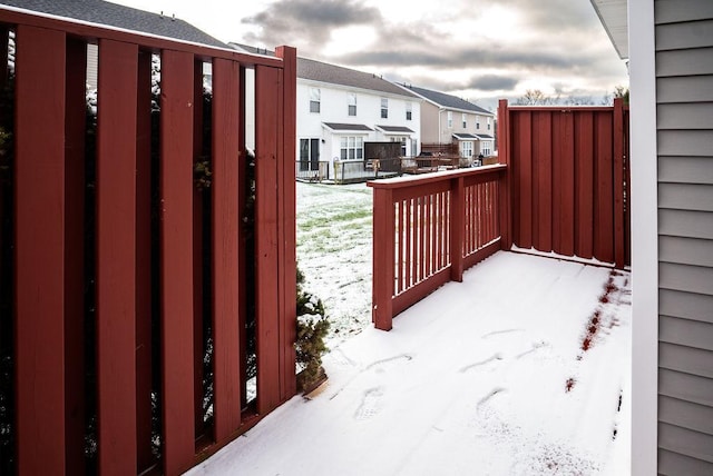 view of snow covered gate