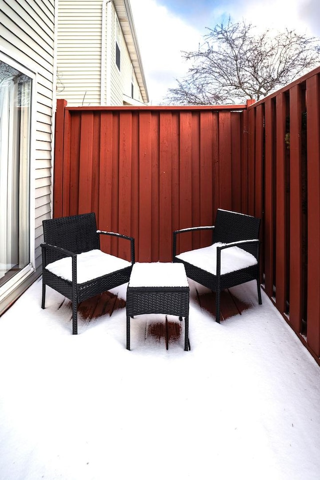 view of snow covered patio