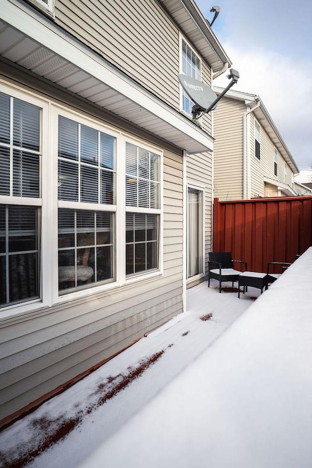 view of snow covered property