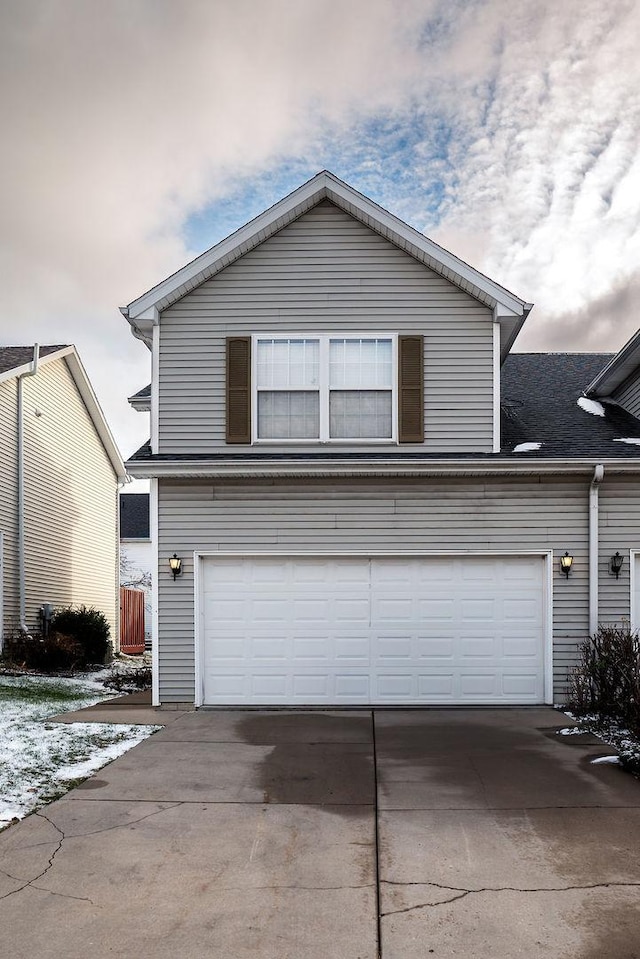 view of property featuring a garage