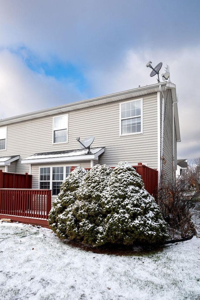 view of snow covered property