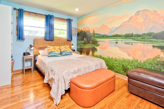 bedroom with light wood-type flooring