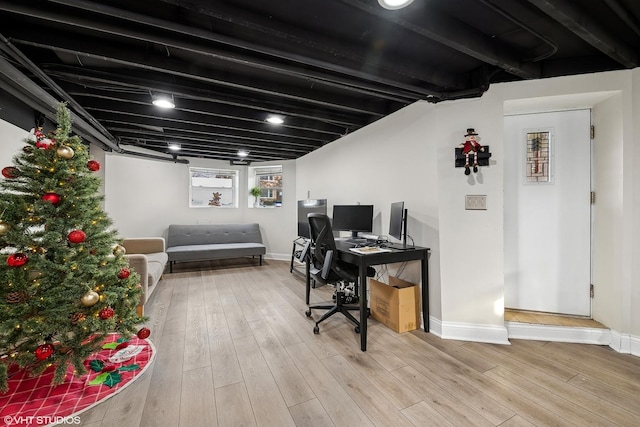 office with light hardwood / wood-style floors