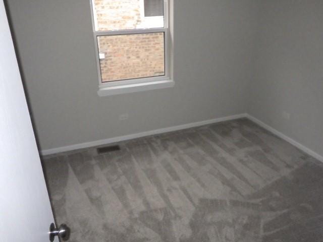 empty room with carpet floors