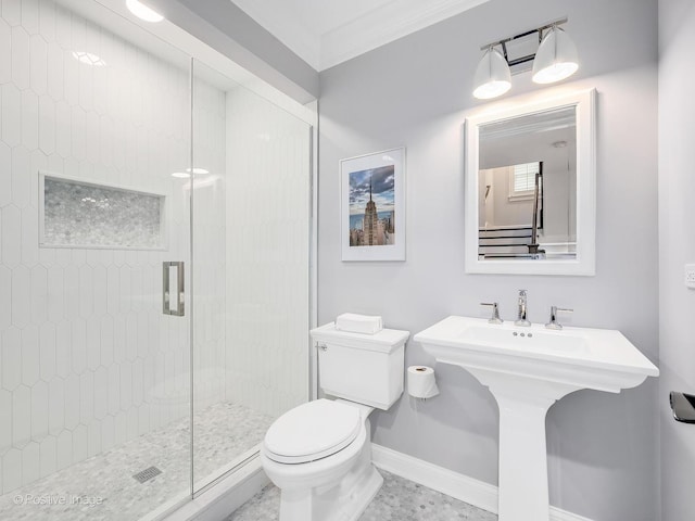 bathroom with ornamental molding, a shower with shower door, sink, and toilet