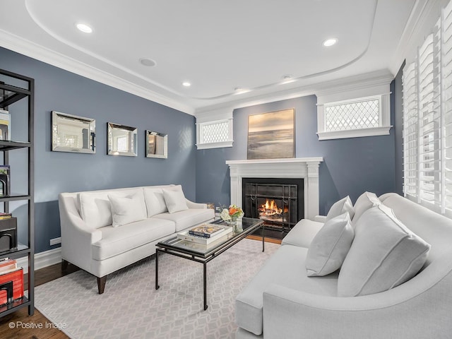 living room featuring ornamental molding and hardwood / wood-style floors