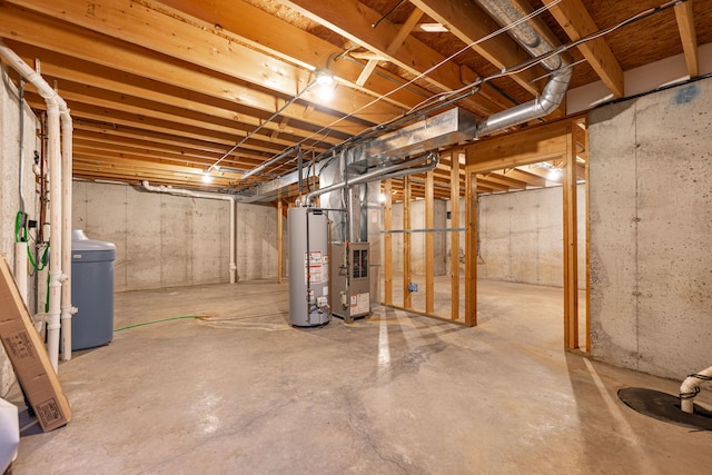 unfinished basement featuring water heater and heating unit