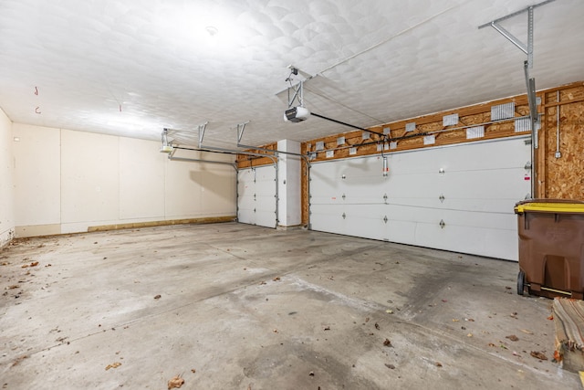 garage featuring a garage door opener