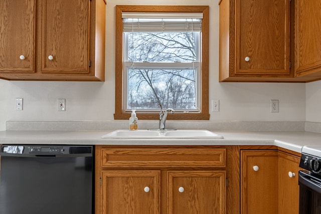 kitchen featuring a sink, brown cabinetry, light countertops, and dishwasher