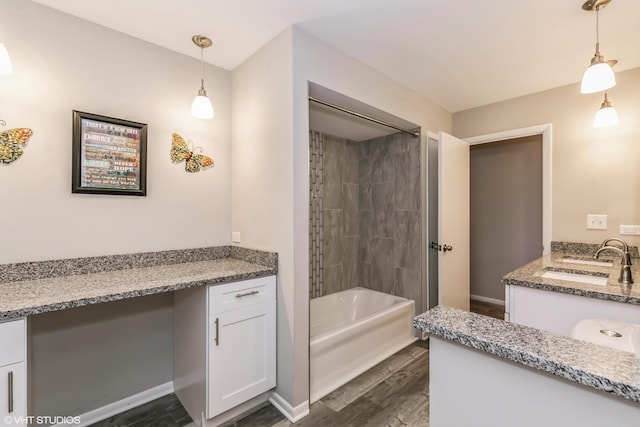 bathroom featuring vanity and hardwood / wood-style flooring