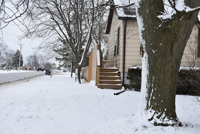 view of snow covered property